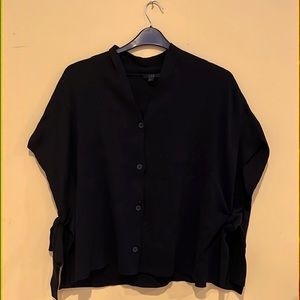 COS sleeveless button up top